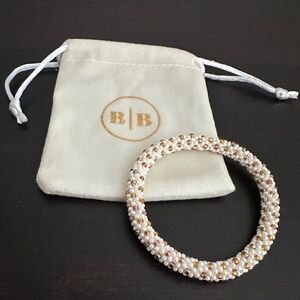Aid Through Trade Roll-On® Bracelet NWOT White & Gold